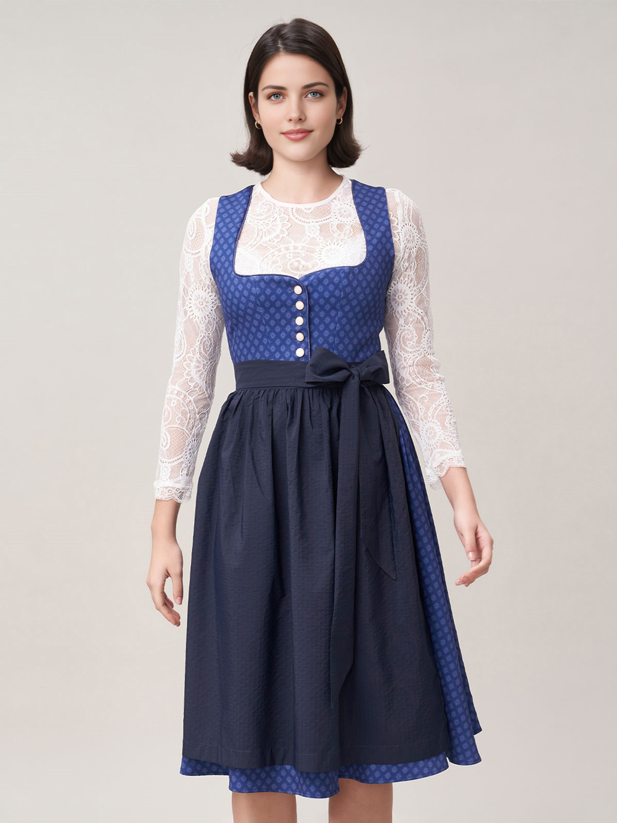 Beiges Dirndl mit blauer Schürze