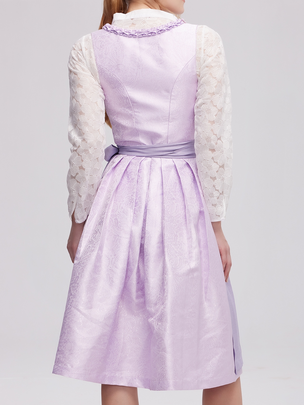 Modernes lila Dirndl mit floralen Details